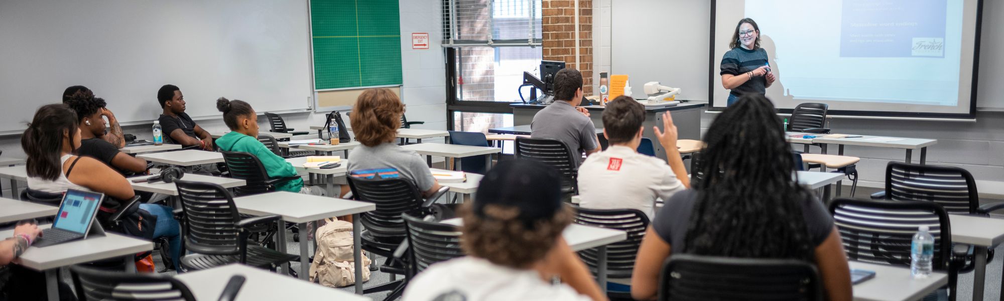 Classroom with students listen to their professor's lecture.