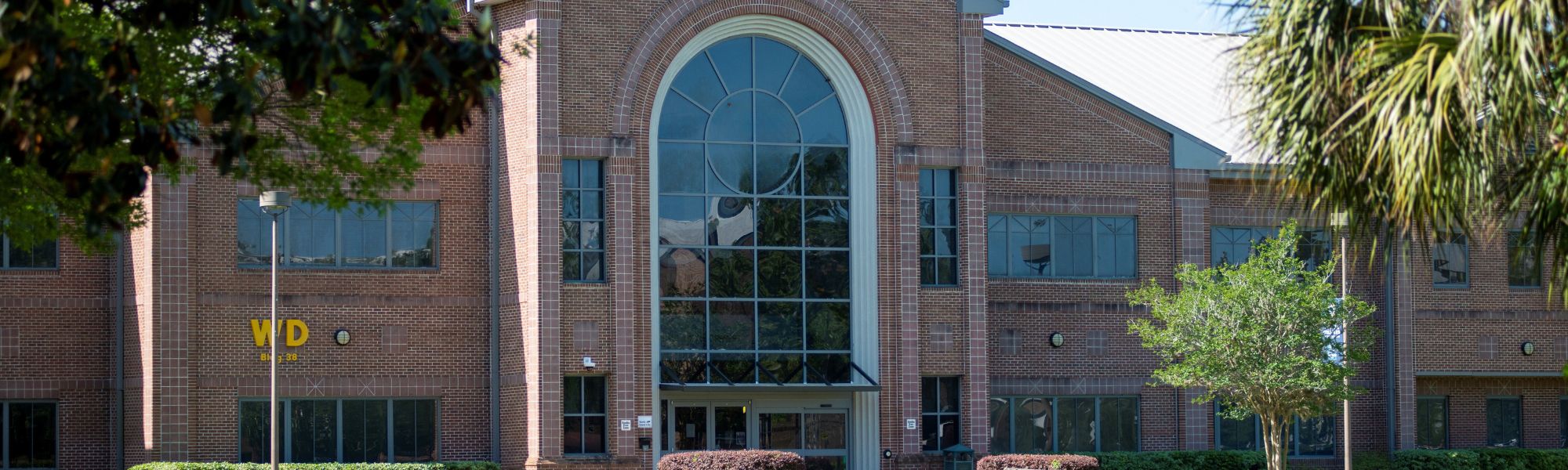 Workforce Development brick building on a sunny day.